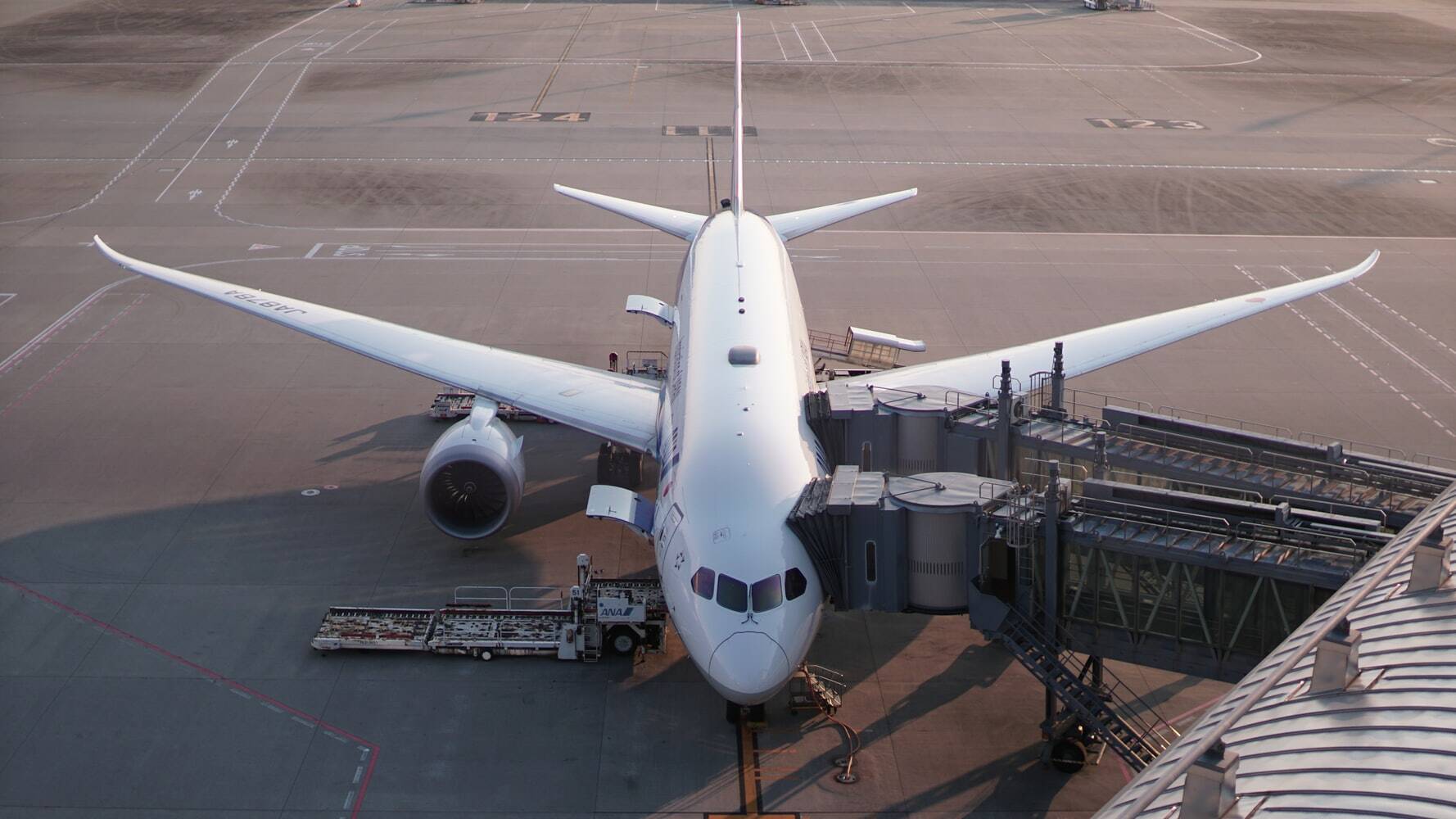 A parked aeroplane on the tarmac, ready for its next flight.